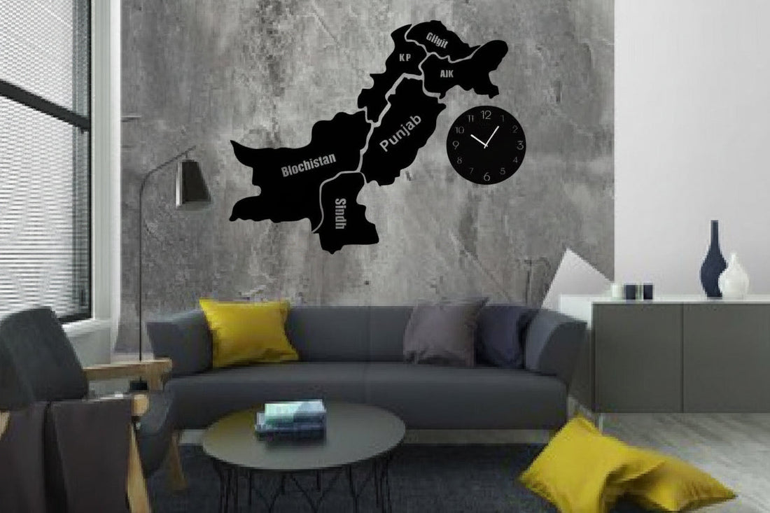 Wall clock shaped like a map of Pakistan in a living room setting.