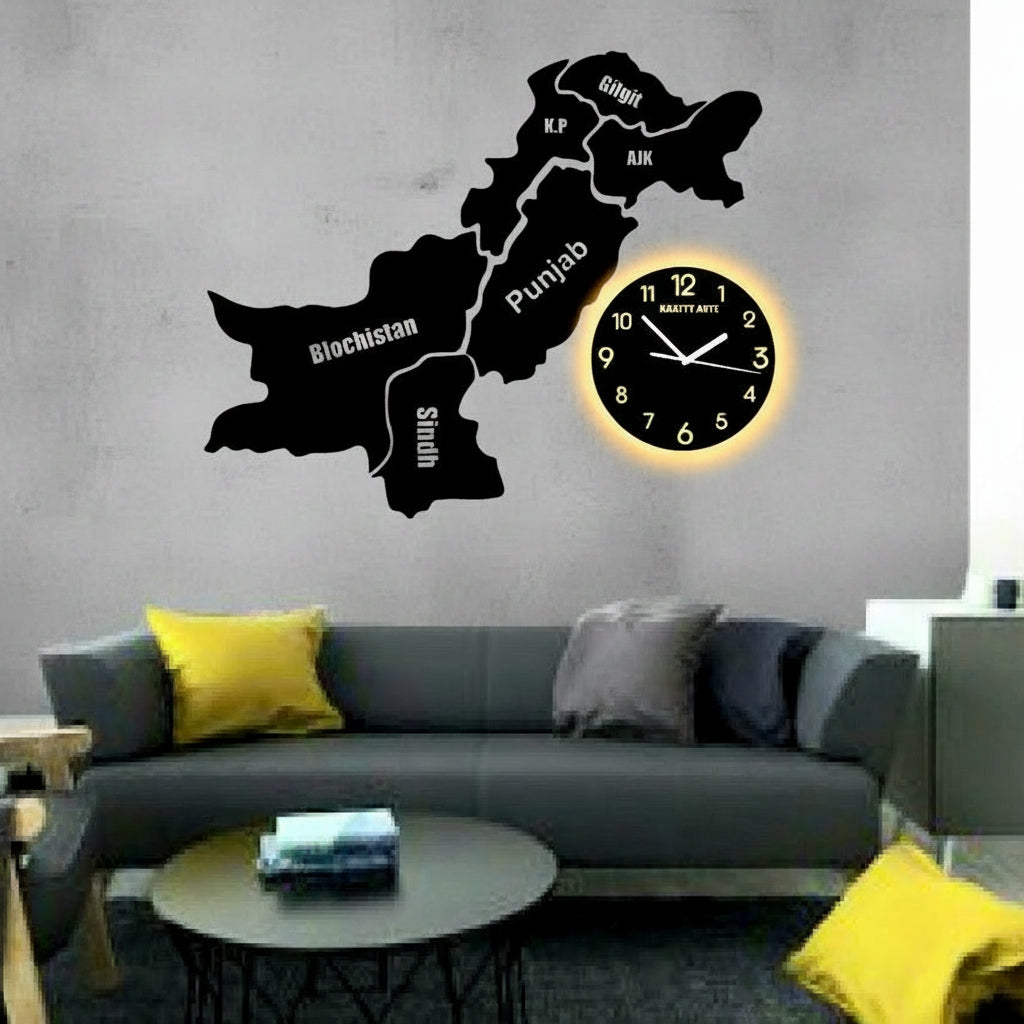 Wall clock shaped like a map of Pakistan in a living room setting.